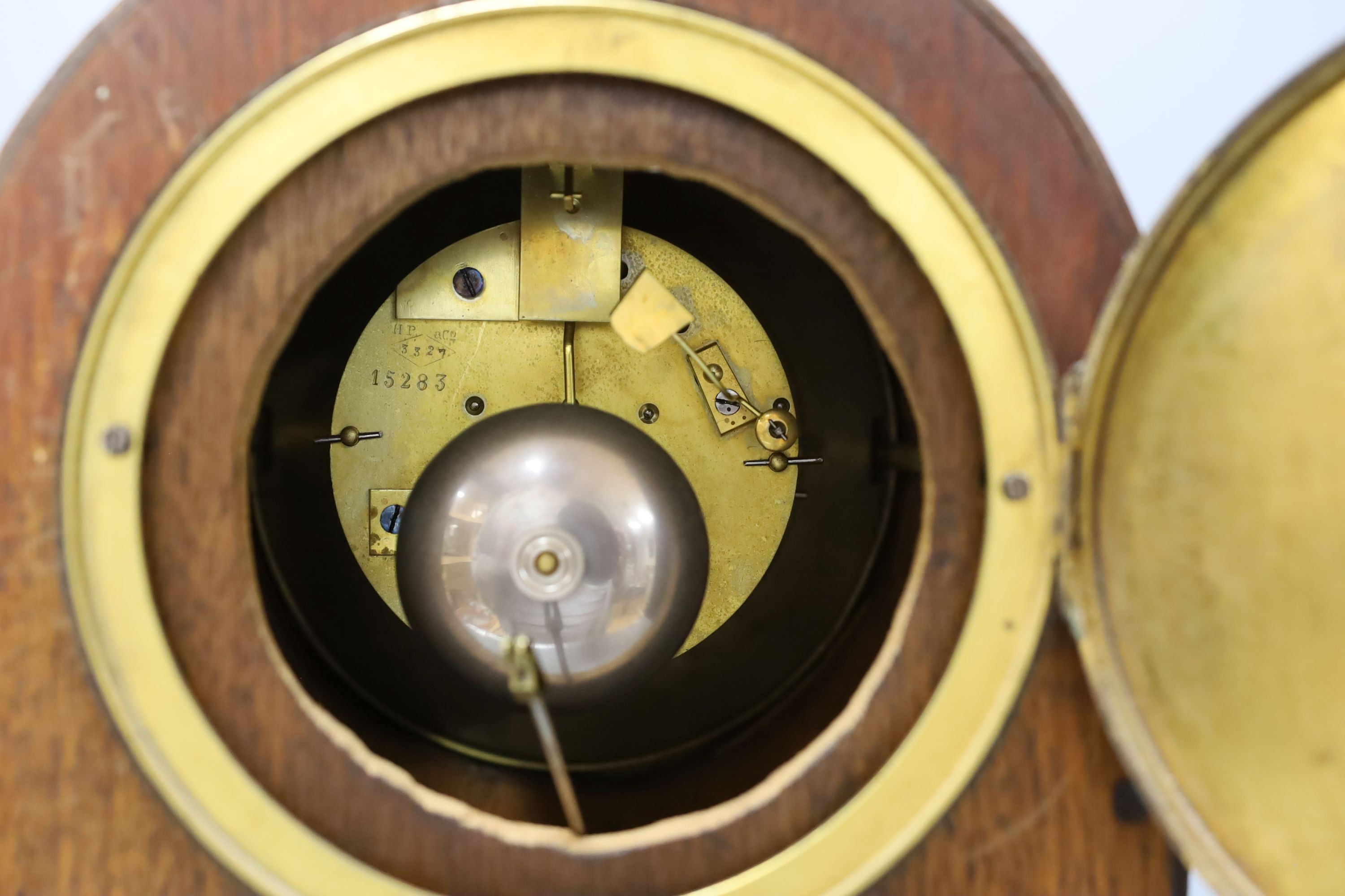 A late Victorian walnut mantel clock, French movement with pendulum, 35cm